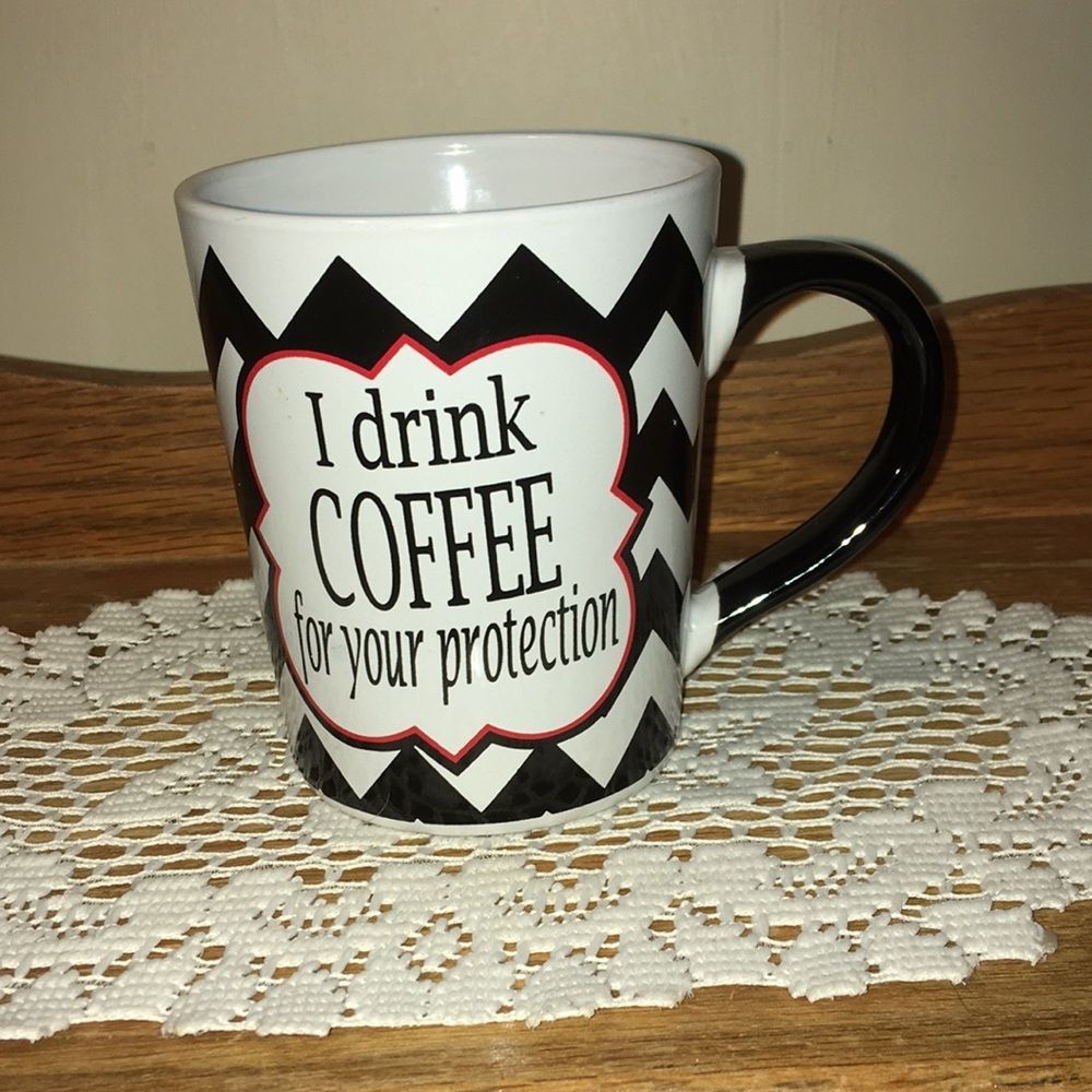 Tumbleweed, black and white coffee mug, “I drink coffee for your protection.”